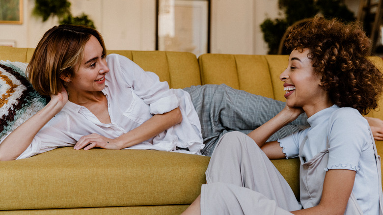 Two women laughing together