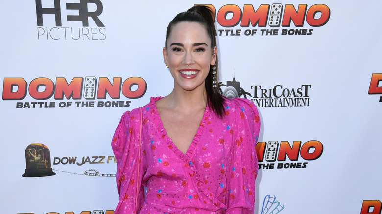 Christa B. Allen smiles while posing for a photo