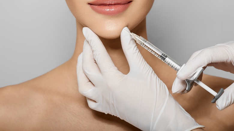 chin filler injection on woman