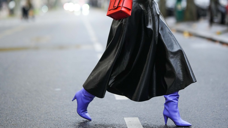 person wearing purple boots