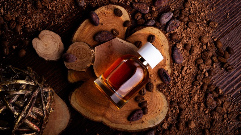 Perfume bottle with cacao beans