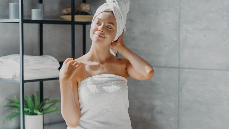 Woman getting out of shower