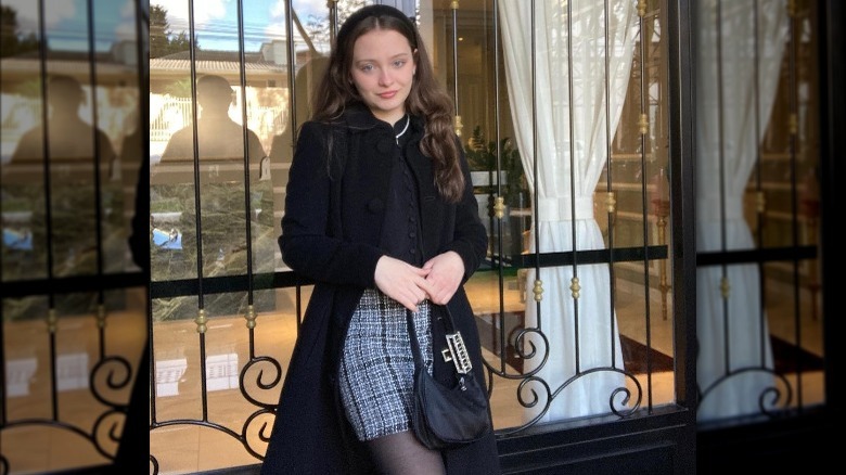 Girl wearing old money plazacore outfit.