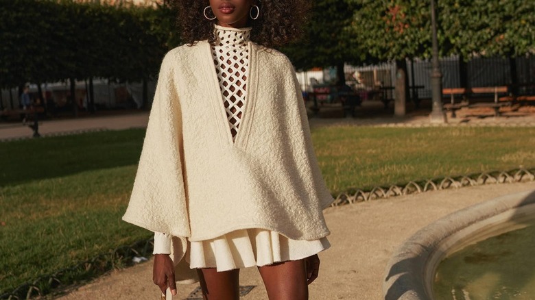 woman wearing white tennis skirt 