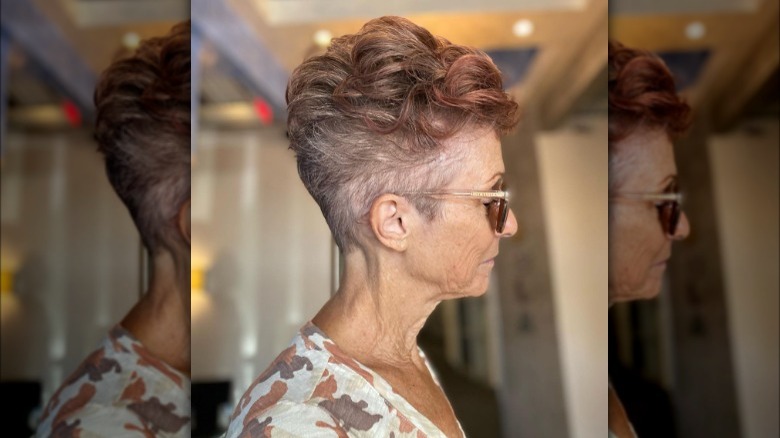 Woman poses with short haircut