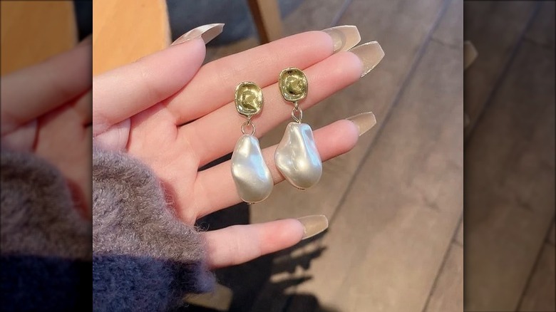 Melted drop earrings featuring pearls