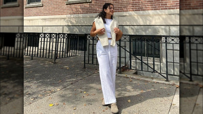 Woman in Birkenstock clogs, linen pants
