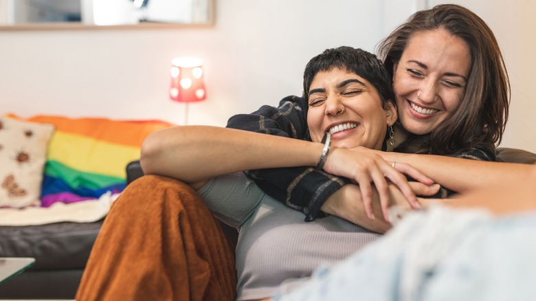 Couple hugging and laughing 
