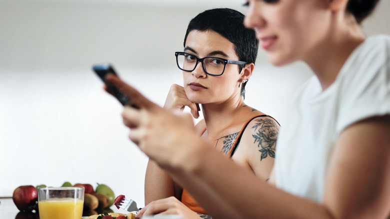 Phone ruining women's date