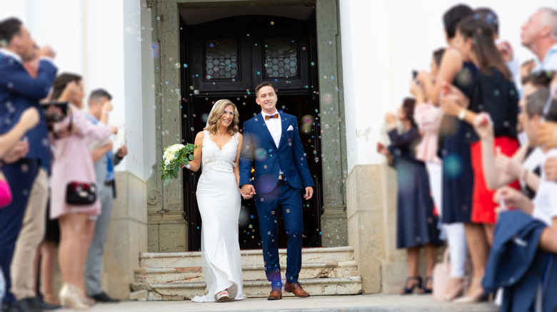 Newlyweds leaving the church
