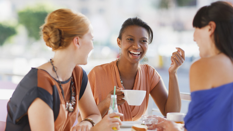 Girlfriends having lunch outside