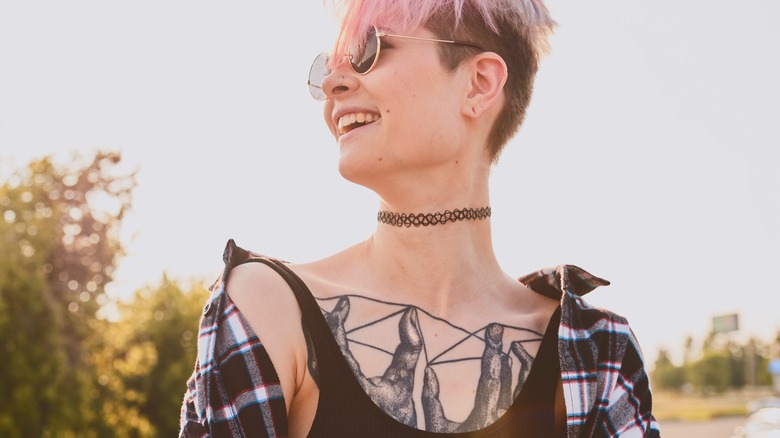 woman with sternum tattoo