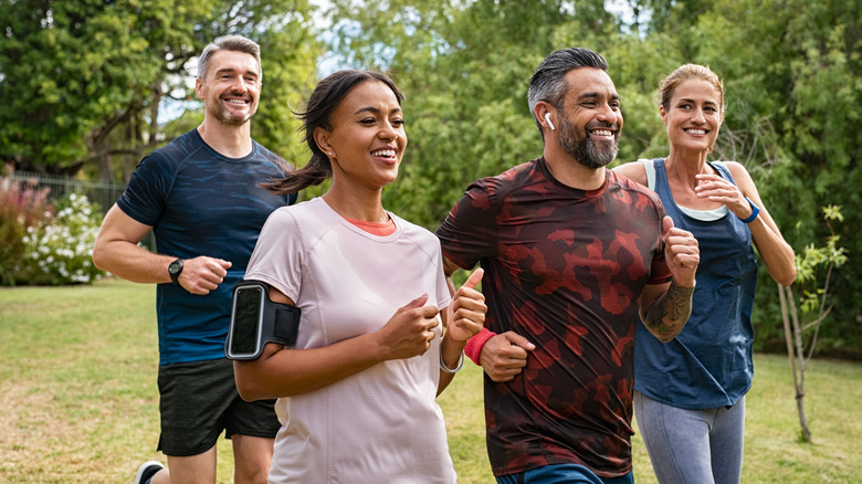 Group of people running together