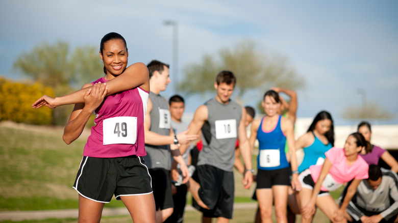 Runners stretching before a race