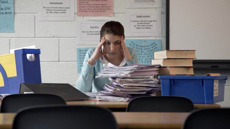 Stressed woman sitting at a desk