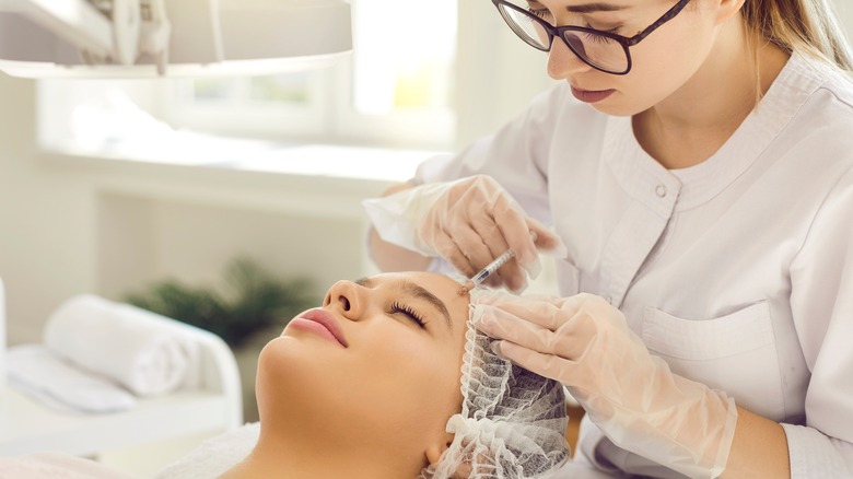 Doctor doing Sculptra treatment