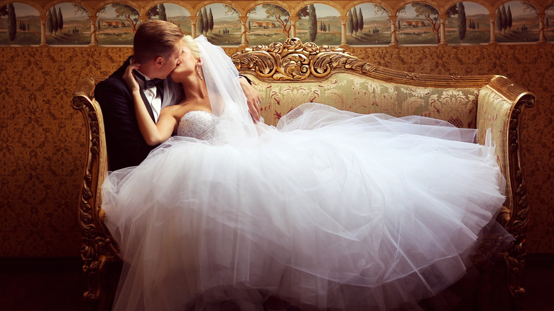 Bride and groom kissing