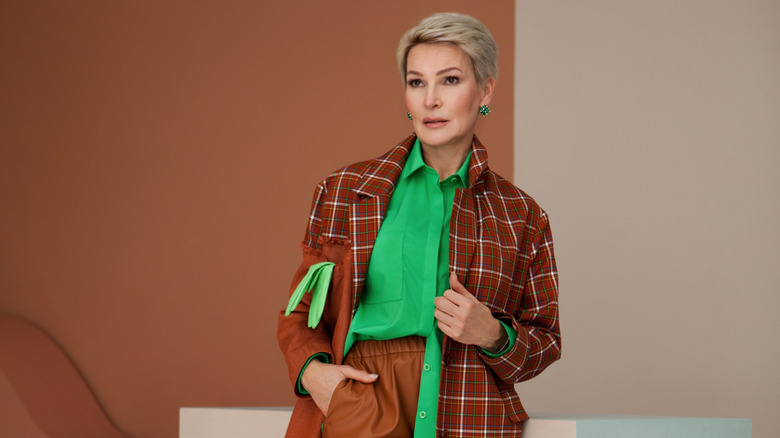Woman wearing plaid jacket