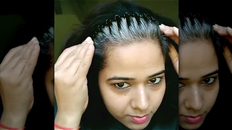 Instagram user screen grab showing dual colored hair style with zig zag headband