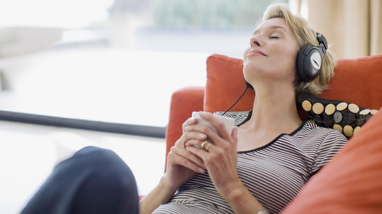 Woman listening to music with headphones