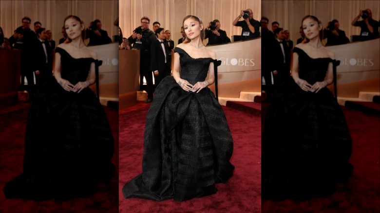 Ariana Grande posing in a black gown
