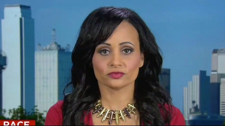 Katrina Pierson wearing a necklace made of bullets on CNN