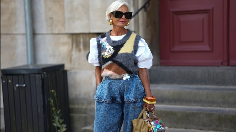 A woman wearing peplum jeans