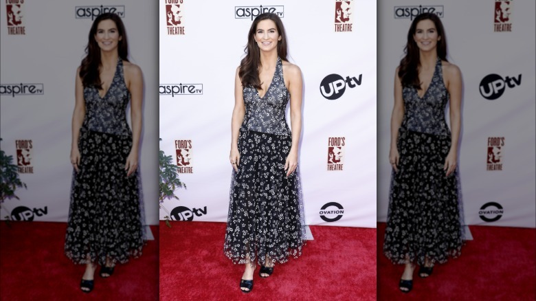 Kaitlan Collins smiles for photos at the 2024 Presidential Gala