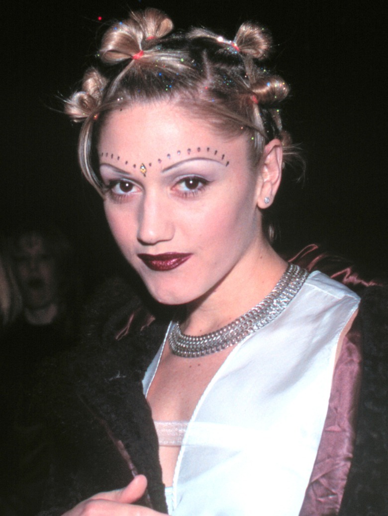 Gwen Stefani posing with dark-red lipstick