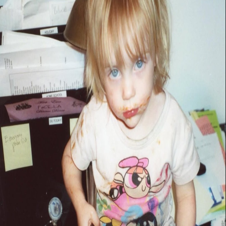 A childhood photo of Billie Eilish with blond hair