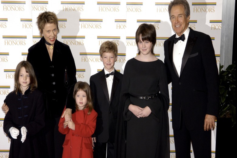 Ella Beattty at four years old wearing a red dress poses for a photo with her three siblings and two parents at The Kennedy Center Honors Weekend